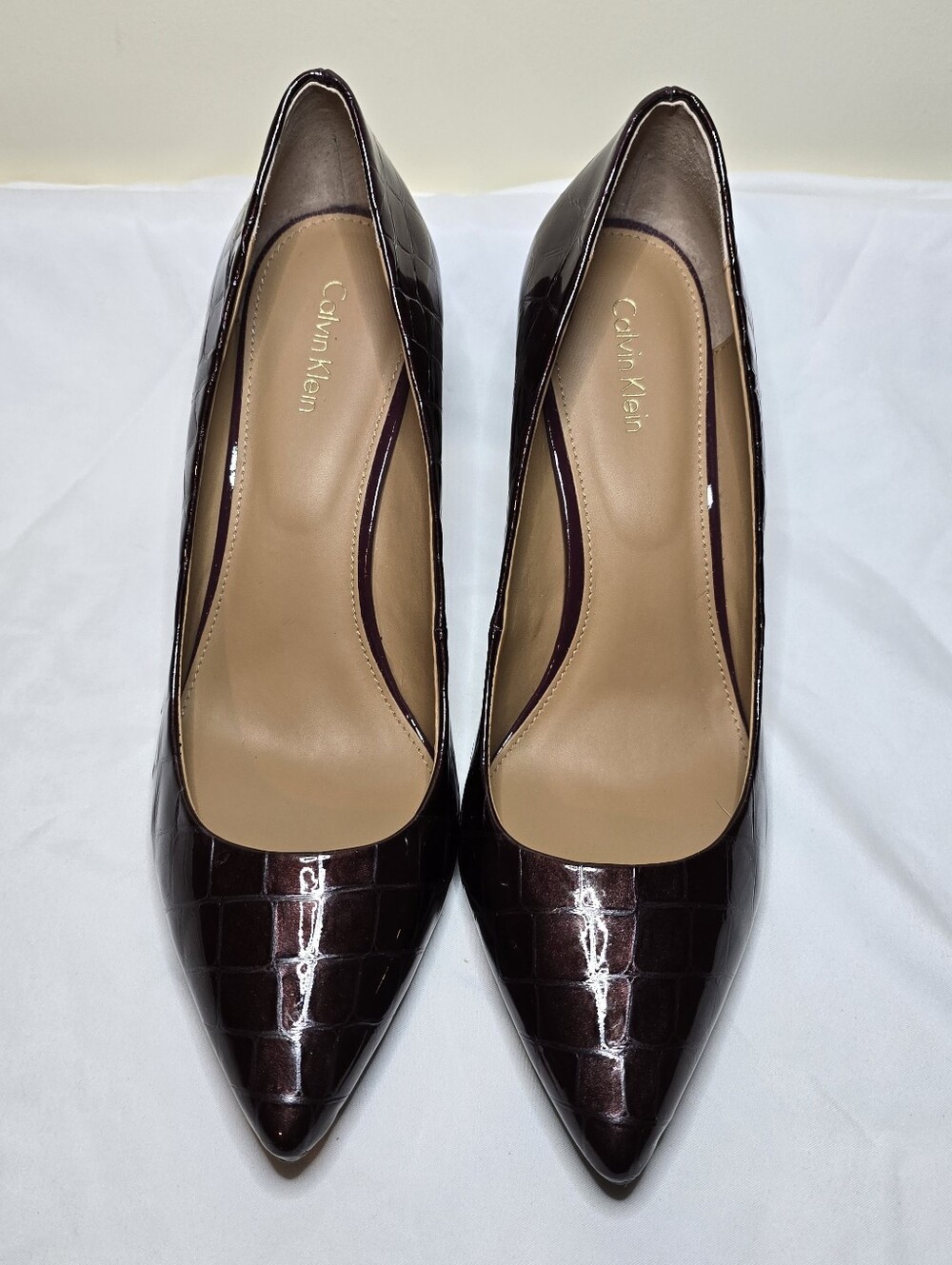 Calvin Klein Gayle croc-embossed leather pumps in a deep burgundy color